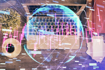 Stock market chart and top view computer on the table background. Multi exposure. Concept of financial analysis.