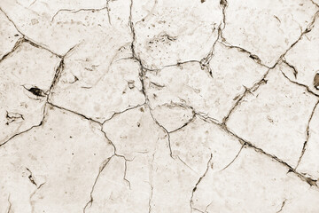 Distressed overlay texture of cracked concrete, stone or asphalt. Grunge background. Abstract illustration
