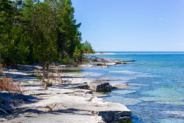 rocky coast and aquamarine water of Great Lakes - Huron Lake, Manitoulin Island, Canada