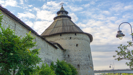 Pskov, Russia. Pokrovskaya tower on the banks of the Velikaya river. 
River embankment. Complex of...