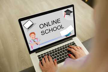 e-learning concept: online school on a laptop screen. Screen graphics are made up.