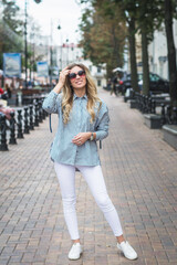 stylish young girl posing for a photographer