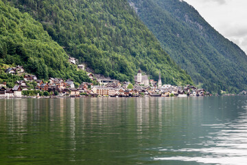 Fototapeta na wymiar Hallstatt small town as postcard view on lake side
