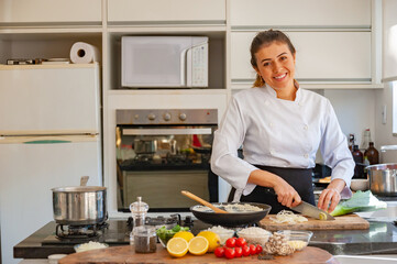 Fototapeta na wymiar young woman cooking