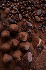 art background with healthy delicious dark truffles, chocolate  and  ingridients:  natural cocoa...