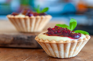 cupcakes with berries and mint