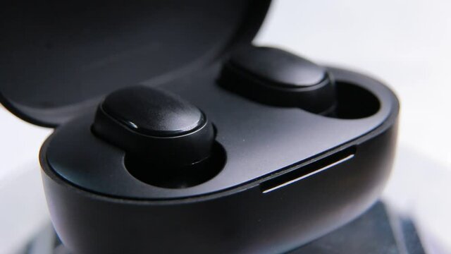 Close up of bluetooth portable true wireless earbuds
