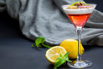 Italian dessert panna cotta with strawberries and lemon