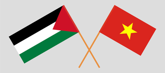 Crossed flags of Palestine and Vietnam