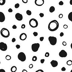 Doodle circles seamless pattern. Black dots texture background.