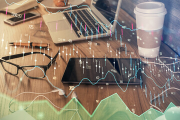 Double exposure of financial graph drawing and cell phone background. Concept of forex trading