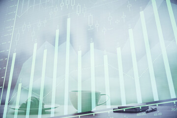 Double exposure of forex chart over coffee cup background in office. Concept of financial analysis and success.