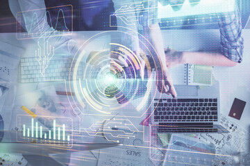 Double exposure of man and woman working together and data theme hologram drawing. Computer background. Top View.