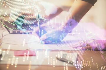 Multi exposure of woman hands typing on computer and financial chart hologram drawing. Stock market analysis concept.