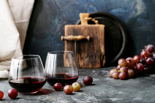 Glass of red wine served with cheese