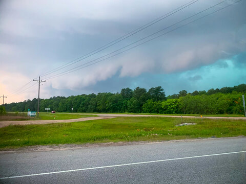 This is a landscape picture of an afternoon storm, coming into Conroe, Texas. 