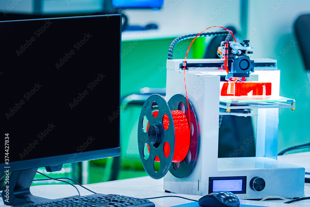 Poster 3d printer. creating three-dimensional objects. the printer prints the object layer by layer. the pr