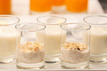 Breakfast Buffet Concept - Breakfast Time in Luxury Hotel. Yogurt in a glass. Fresh natural...