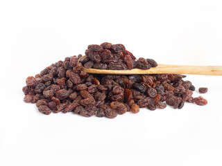 Raisin with spoon wooden isolate on white background, Currant,Raisin sec, Black Corinth, Zante currant.This have minerals iron, potassium, Magnesium.