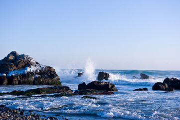 The seascape  with huge wave and rocks.