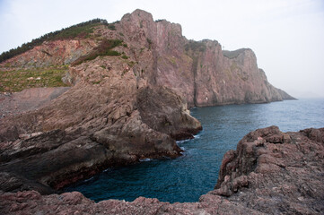 The beautiful landscape of sea side and rock beach.