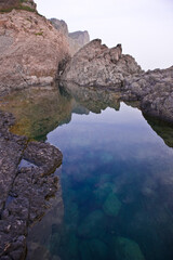 The beautiful landscape of sea side and rock beach.