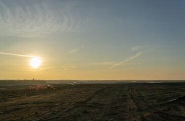 Wooden fence on a field / Sunset on the beach / sunset over the river