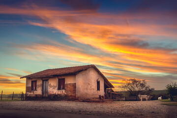 Plakat old barn at sunset