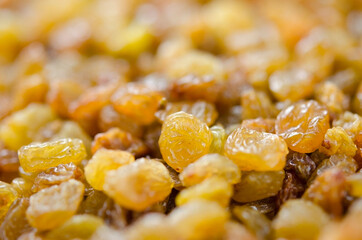 Raisins close up. Dry grapes. Dried fruits for healthy food, dessert substitute