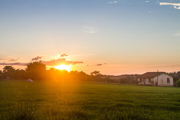 Obraz na płótnie Canvas sunrise over the field
