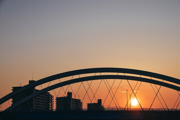 Naklejka premium 夕焼けと橋