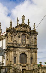 Ornate baroque facade of the Igreja dos Clerigos church in old town Porto, Portugal