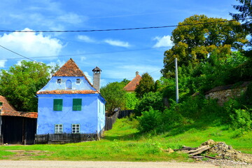 Typical rural landscape and peasant houses in Beia,  Transylvania, Romania. The settlement was founded by the Saxon colonists in the middle of the 12th century