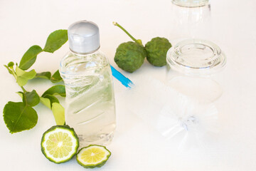 cleanser liquid washing extract from herbal kaffir lime for cleaning product health care of baby on background white 