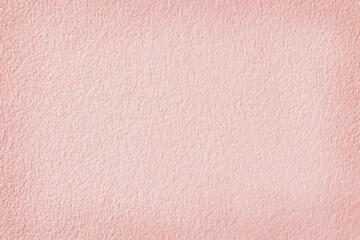 Fototapeta premium Light pink pastel color concrete wall texture for background and design.