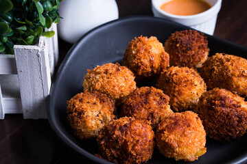 Korokke or Japanese potato croquettes  are made from mashed potato mixed with ground beef and carrots then deep fried