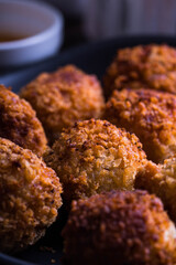Korokke or Japanese potato croquettes  are made from mashed potato mixed with ground beef and carrots then deep fried