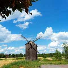 Windmill near Saint Nicolas church build by Kochubey family in 19 century in Dykanka, Ukraine on...