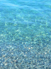 crystal clear turquoise blue water. azure coast.  stone under crystal water