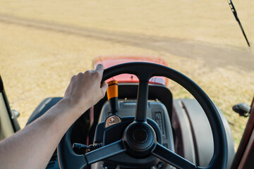 Driving a tractor. First-person view