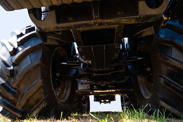 Bottom view of tractor. Close up of wheels