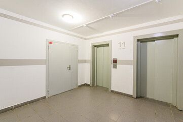 Russia, Moscow- February 15, 2020: interior room public place, house entrance. doors, walls, staircase corridors