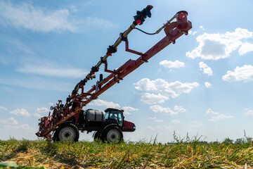 Machine for spraying pesticides and herbicides on the field 