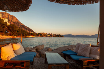 Lounge bar by the Mediterranean sea in Croatia - obrazy, fototapety, plakaty