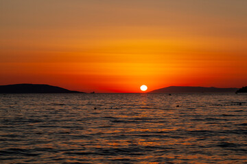 Obraz premium Sunset by the beach - Mediterranean sea