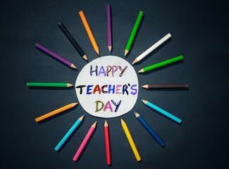Happy Teacher's Day Creative Photo with Color Pencils on Black Background, Perfect for Wallpaper