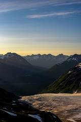 Naklejka premium sunset over the mountains