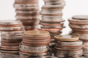 Piles of Thai baht coins arranged in descending order, concept of money and statistics, investment concept. 