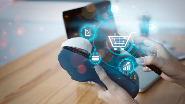 Futuristic concept Asian girl payment terminal on smartphone scanning credit card machine in supermarket shopping mall counter service, internet of things icon, smart pay online for business service