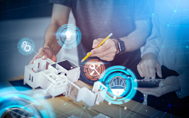 Futuristic modern engineer architecture working on house model blueprint using calculator planning calculating designing building construction inspective workplace architectural project, hologram icon